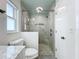Walk-in shower with pebble floor and glass enclosure at 161 Sandhurst Dr, Venice, FL 34293