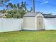 Tan colored storage shed in backyard at 161 Sandhurst Dr, Venice, FL 34293