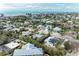 Aerial showing neighborhood homes near the ocean at 219 Periwinkle Plz, Anna Maria, FL 34216