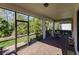 Relaxing screened patio with table and chairs at 2479 Brassica Dr, North Port, FL 34289