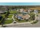 Aerial view of community park with playground and walking paths at 252 Caserta Ct, North Venice, FL 34275