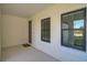 Front entry with neutral colored walls and modern door at 252 Caserta Ct, North Venice, FL 34275