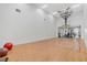 Spacious gym features a basketball hoop, hard wood floors, and fitness equipment at 4178 Central Sarasota Pkwy # 316, Sarasota, FL 34238