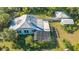 Property features a house, detached garage, and large backyard at 2525 Ashton Rd, Sarasota, FL 34231