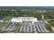 Aerial view of a high school with large parking lot at 2525 Ashton Rd, Sarasota, FL 34231