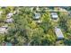 Lot features a house, outbuildings, and lush vegetation at 2525 Ashton Rd, Sarasota, FL 34231