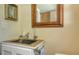 Small bathroom with updated sink, vanity, and mirror at 2525 Ashton Rd, Sarasota, FL 34231