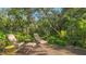 Relaxing deck in a tranquil backyard setting at 2525 Ashton Rd, Sarasota, FL 34231