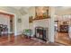 A charming white brick fireplace is the focal point of this living space at 2525 Ashton Rd, Sarasota, FL 34231