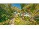 Stone pathway leads to charming bungalow at 2525 Ashton Rd, Sarasota, FL 34231