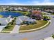 Home situated on a corner lot near a lake at 5755 Carriage Dr, Sarasota, FL 34243