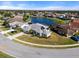 House with a lake view in a residential area at 5755 Carriage Dr, Sarasota, FL 34243