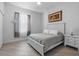Bright bedroom with a queen bed and plenty of closet space at 5755 Carriage Dr, Sarasota, FL 34243