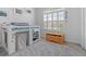 bedroom with built-in bunk bed, window seat, and ample storage at 5755 Carriage Dr, Sarasota, FL 34243