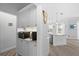 Built-in kitchen coffee bar with microwave and additional storage at 5755 Carriage Dr, Sarasota, FL 34243