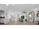Spacious living room features an open floor plan and kitchen at 5755 Carriage Dr, Sarasota, FL 34243