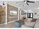 Living room boasts a stylish wall accent and ample natural light at 5755 Carriage Dr, Sarasota, FL 34243