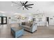 Living room features an open floor plan with kitchen access at 5755 Carriage Dr, Sarasota, FL 34243