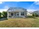 Enclosed pool and spa area with screened enclosure at 5755 Carriage Dr, Sarasota, FL 34243