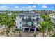 Attractive three story home with a metal roof and spacious balconies at 6506 Gulf Dr, Holmes Beach, FL 34217
