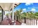 Relaxing balcony overlooking the neighborhood at 6506 Gulf Dr, Holmes Beach, FL 34217