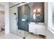 Modern bathroom with a walk-in shower and floating vanity at 6506 Gulf Dr, Holmes Beach, FL 34217