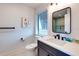 Bathroom with vanity, toilet and shower at 6506 Gulf Dr, Holmes Beach, FL 34217