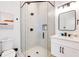 Bathroom with walk-in shower and modern fixtures at 6506 Gulf Dr, Holmes Beach, FL 34217