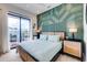 Guest bedroom with king bed and access to balcony at 6506 Gulf Dr, Holmes Beach, FL 34217