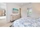 Bedroom with a view, dresser, and king-size bed at 6506 Gulf Dr, Holmes Beach, FL 34217