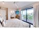 Main bedroom with large sliding door to private balcony at 6506 Gulf Dr, Holmes Beach, FL 34217