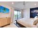 Coastal bedroom with a king bed and private balcony at 6506 Gulf Dr, Holmes Beach, FL 34217