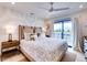 Spacious bedroom with king-size bed and private balcony access at 6506 Gulf Dr, Holmes Beach, FL 34217