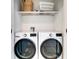 Laundry closet with LG washer and dryer at 6506 Gulf Dr, Holmes Beach, FL 34217