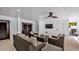 Covered patio with comfortable seating and a flat screen TV at 6506 Gulf Dr, Holmes Beach, FL 34217