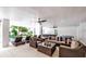 Covered patio with comfortable seating and pool view at 6506 Gulf Dr, Holmes Beach, FL 34217