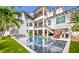 Large rectangular pool and spa with a spacious backyard at 6506 Gulf Dr, Holmes Beach, FL 34217