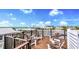 Spacious rooftop deck with ocean views and comfortable seating at 6506 Gulf Dr, Holmes Beach, FL 34217
