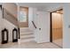 Modern staircase with wood and metal accents, and home elevator at 6506 Gulf Dr, Holmes Beach, FL 34217