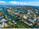 Wide aerial view of waterfront community at 671 Emerald Harbor Dr, Longboat Key, FL 34228