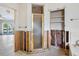 Under renovation bathroom with shower and shelving at 671 Emerald Harbor Dr, Longboat Key, FL 34228
