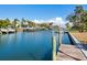 Scenic waterfront property with private dock and boats at 671 Emerald Harbor Dr, Longboat Key, FL 34228