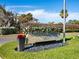 Emerald Harbor community sign with holiday decorations at 671 Emerald Harbor Dr, Longboat Key, FL 34228