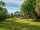 Park gazebo with a metal roof and wooden deck at 671 Emerald Harbor Dr, Longboat Key, FL 34228