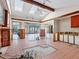 Under renovation: gutted kitchen space with exposed beams at 671 Emerald Harbor Dr, Longboat Key, FL 34228