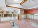 Under renovation: gutted kitchen with exposed beams and skylights at 671 Emerald Harbor Dr, Longboat Key, FL 34228