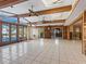 Spacious living room with large windows and pool view at 671 Emerald Harbor Dr, Longboat Key, FL 34228