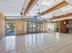 Bright living area featuring large windows and water access at 671 Emerald Harbor Dr, Longboat Key, FL 34228