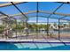 Screened pool and canal view. Features a tranquil outdoor space at 671 Emerald Harbor Dr, Longboat Key, FL 34228