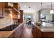 Eat-in kitchen with granite countertops and stainless steel appliances at 7115 Callander Cv, Lakewood Ranch, FL 34202